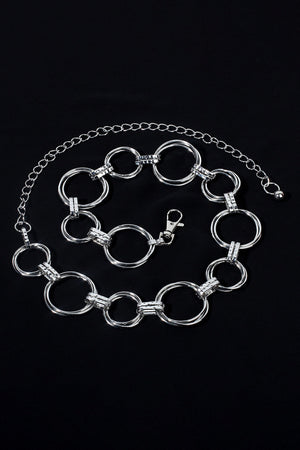 Silver alloy linked circle waist chain belt with lobster clasp and extender chain.