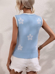 Light blue knit tank top with white daisy motif and ribbed trim.
