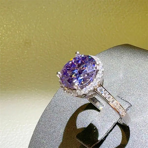 Violet halo sterling silver ring with oval purple gemstone and diamond band