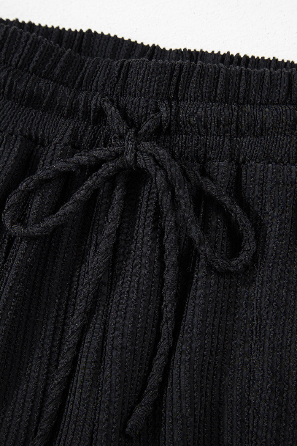 Black textured ribbed lounge set shorts with drawstring waist
