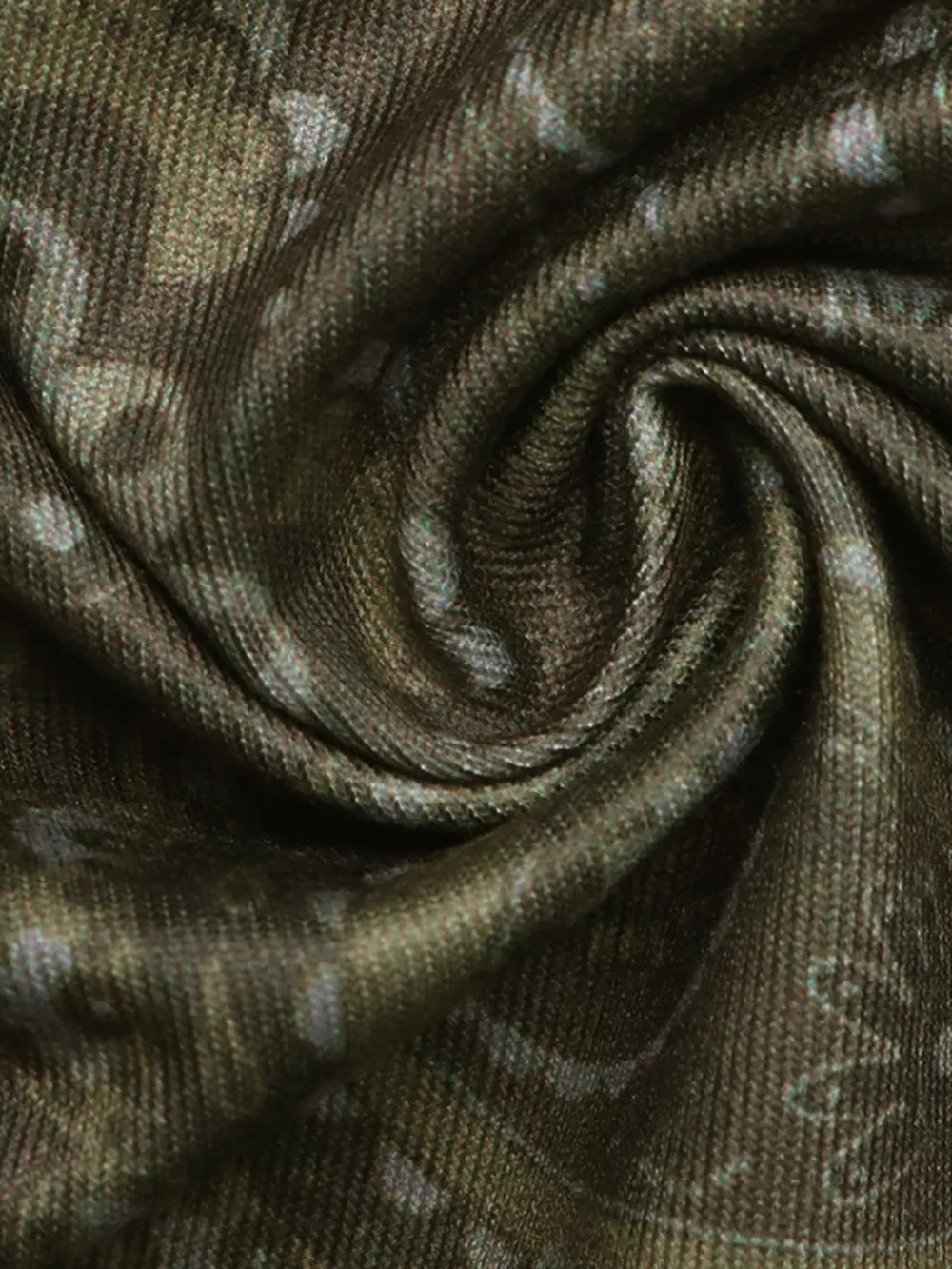Vibrant paisley print bandeau top in a textured fabric with a swirling pattern.