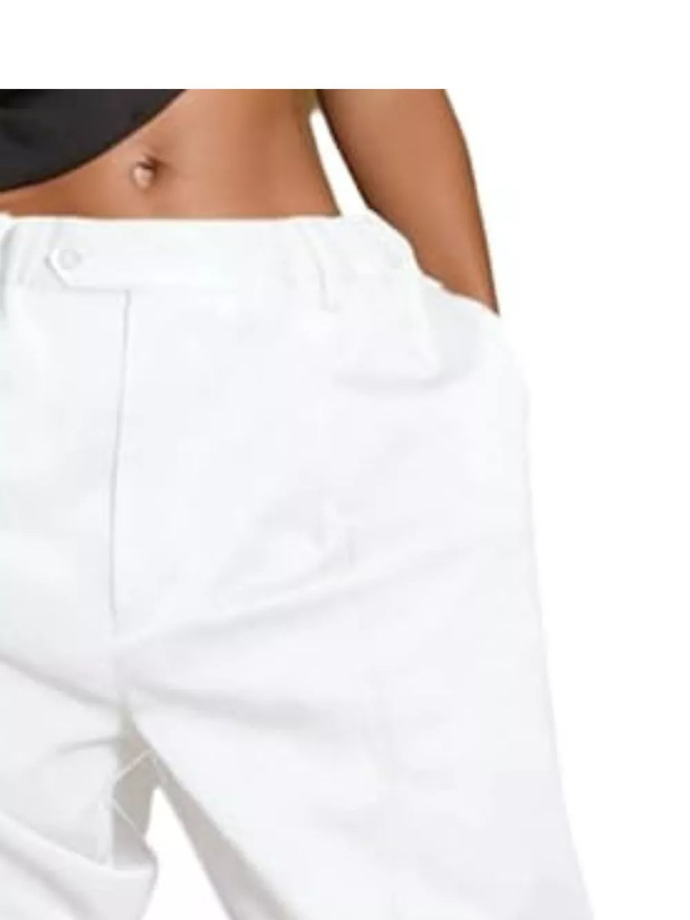 White pleated high-waisted shorts with drawstring and button detail.
