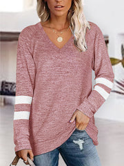 Dusty pink raglan v-neck top with white varsity stripes on sleeves