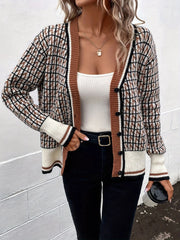 Geometric knit cardigan in caramel with button front and contrast trim.