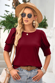 Burgundy puffed sleeve top with button cuff detail