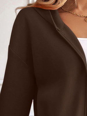 Chocolate cropped hooded zip-up sweatshirt with a relaxed fit.
