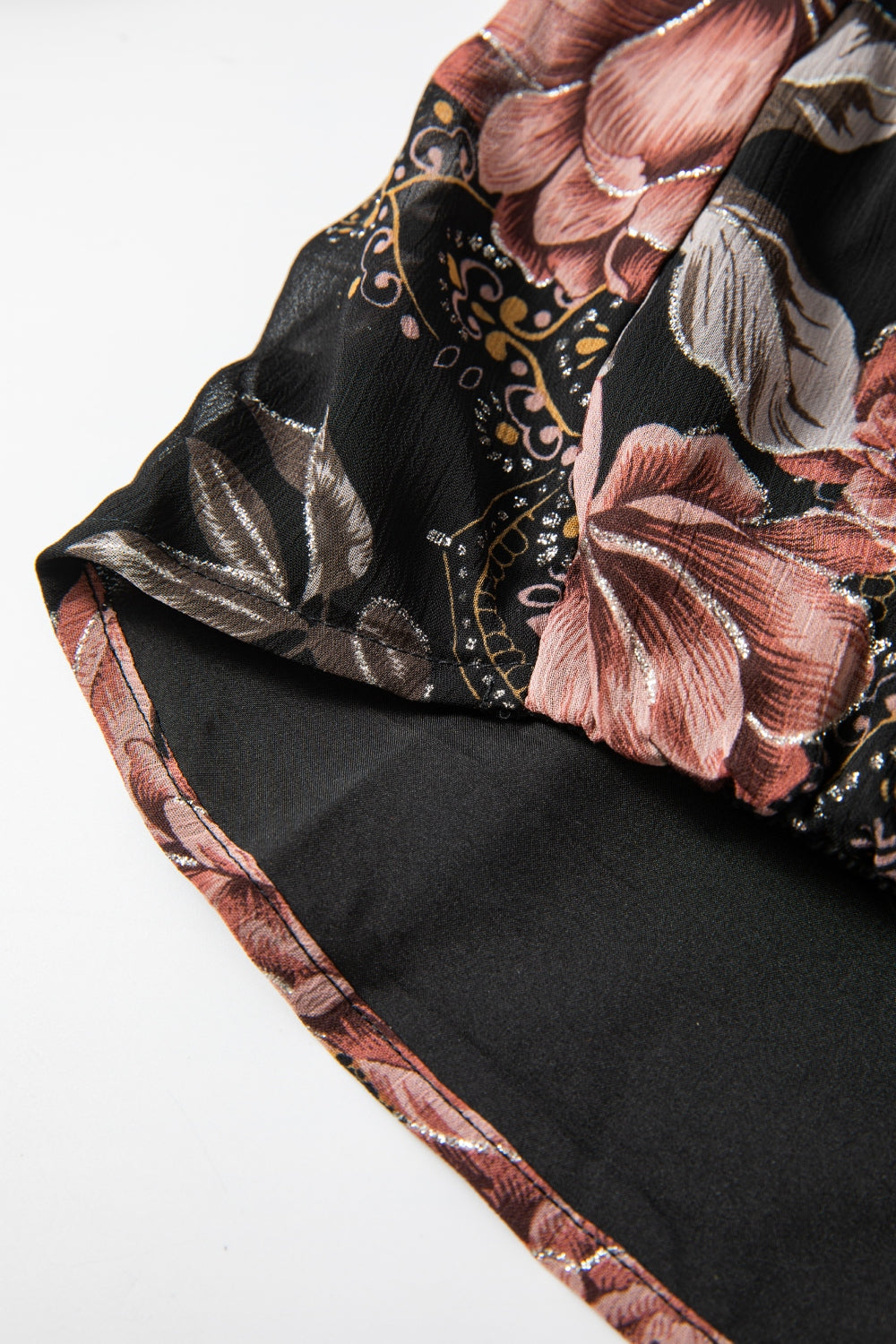 Black floral print blouse with blouson sleeves and metallic thread detail