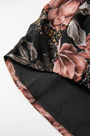 Black floral print blouse with blouson sleeves and metallic thread detail