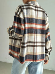 Relaxed fit plaid shirt jacket in mocha with button front and classic collar.
