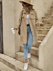 Oversized teddy bear shacket in camel with button-down front and chest pockets.