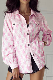 Pink diamond weave shacket with puff sleeves and buttoned front pockets.