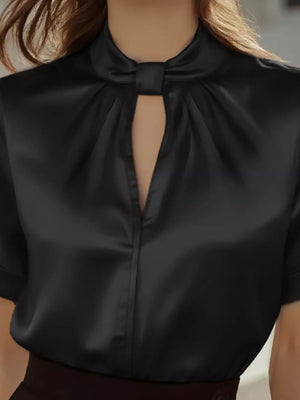 Black satin blouse with keyhole neckline and tie detail