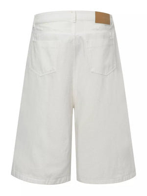 Relaxed fit white wide leg sweatpants with back pockets and a leather logo patch.