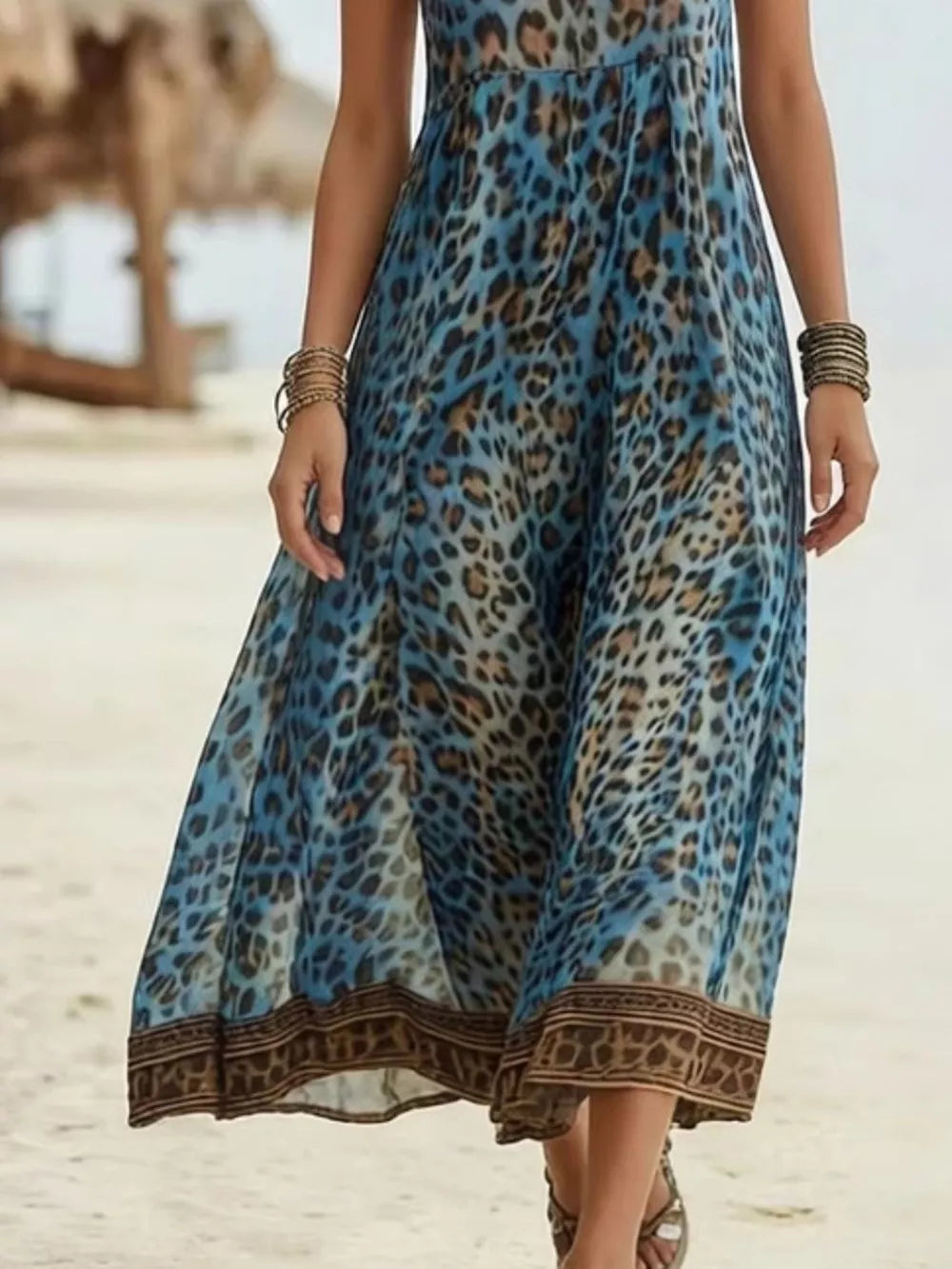 Dusty blue leopard print midi dress with V-neck and border hem