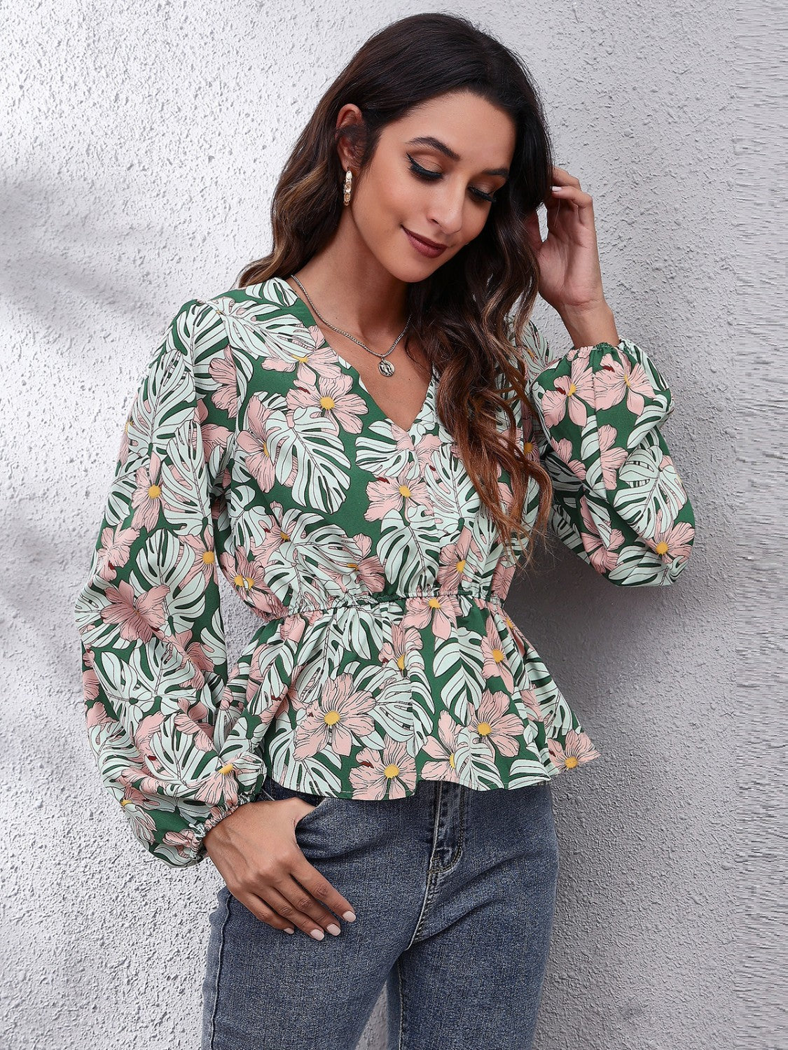 Green tropical print peplum blouse with V-neck and balloon sleeves