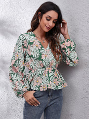 Green tropical print peplum blouse with V-neck and balloon sleeves