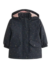 Toddler navy zip-up jacket with allover heart pattern and pink lining.