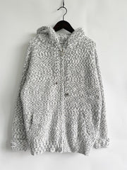 Speckled knit relaxed zip-up hoodie in white with a geometric pattern and drawstring hood.