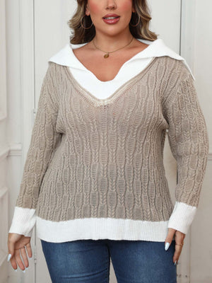 Khaki cable knit sweater with white contrast collar and cuffs.