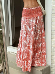 Bohemian paisley maxi skirt in burnt coral with smocked waist and tiered hem