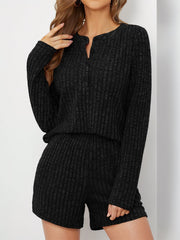 Black ribbed henley loungewear set with button detail and shorts.