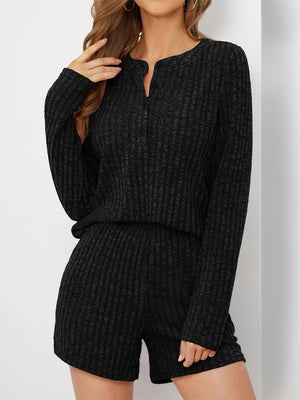 Black ribbed henley loungewear set with button detail and shorts.