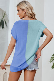 Split-tone knit tee with dolman sleeves in blue and aqua, featuring a relaxed fit.