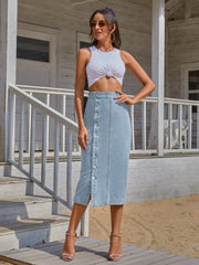 Button-front denim midi skirt in Sky Blue with a slit and button closure.