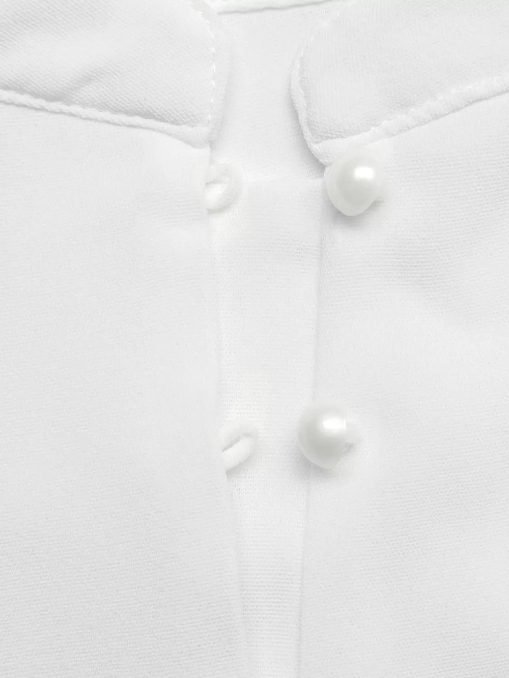 White midi dress with cap sleeves, button detail and tie detail