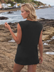 Black openwork button-down knit vest with a ribbed texture.