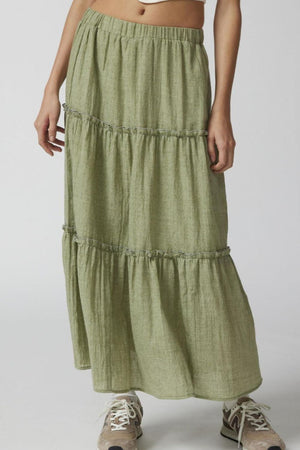 Tiered cotton maxi skirt in matcha green with ruffled seams and elastic waist