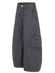 Grey wide-leg cargo pants with prominent pocket details and contemporary cut.