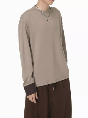 Relaxed fit long sleeve t-shirt in coffee color with contrasting dark brown cuffs.