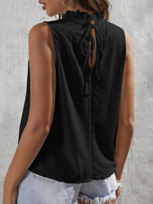 Black eyelet tank top with ruffled neckline and back tie detail