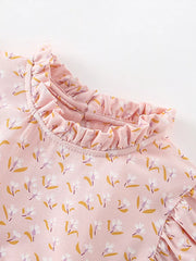 Toddler dress in pink with floral print, ruffle neckline and sleeves.