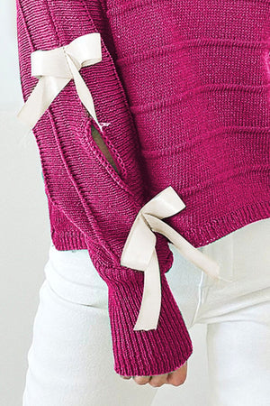 Deep Rose ribbed knit sweater with bow sleeve detail, acrylic fabric.