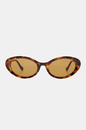 Brown tortoise oval sunglasses with amber lenses