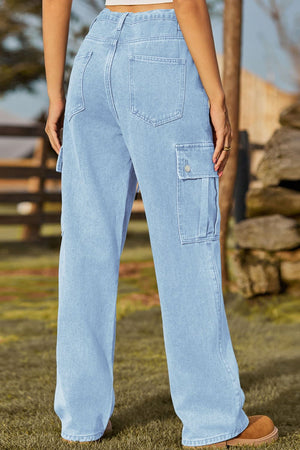 Light wash denim cargo pants with button flap pockets and wide leg.