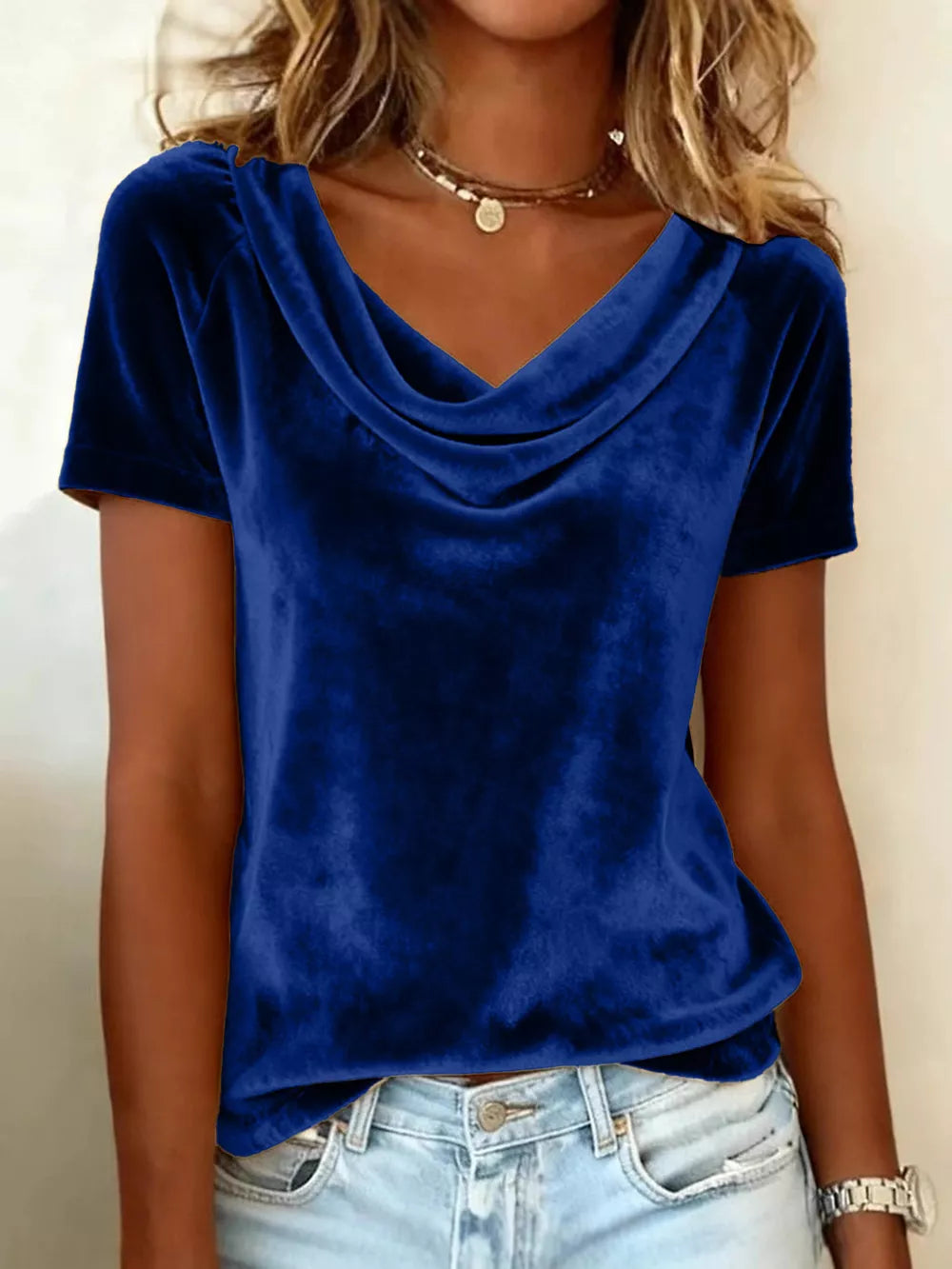 Blue velvet cowl neck t-shirt with short sleeves and relaxed fit.