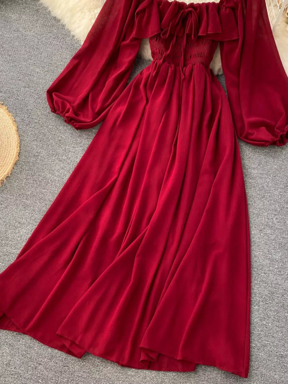 Red ruffled square neck maternity dress with balloon sleeves and a-line skirt