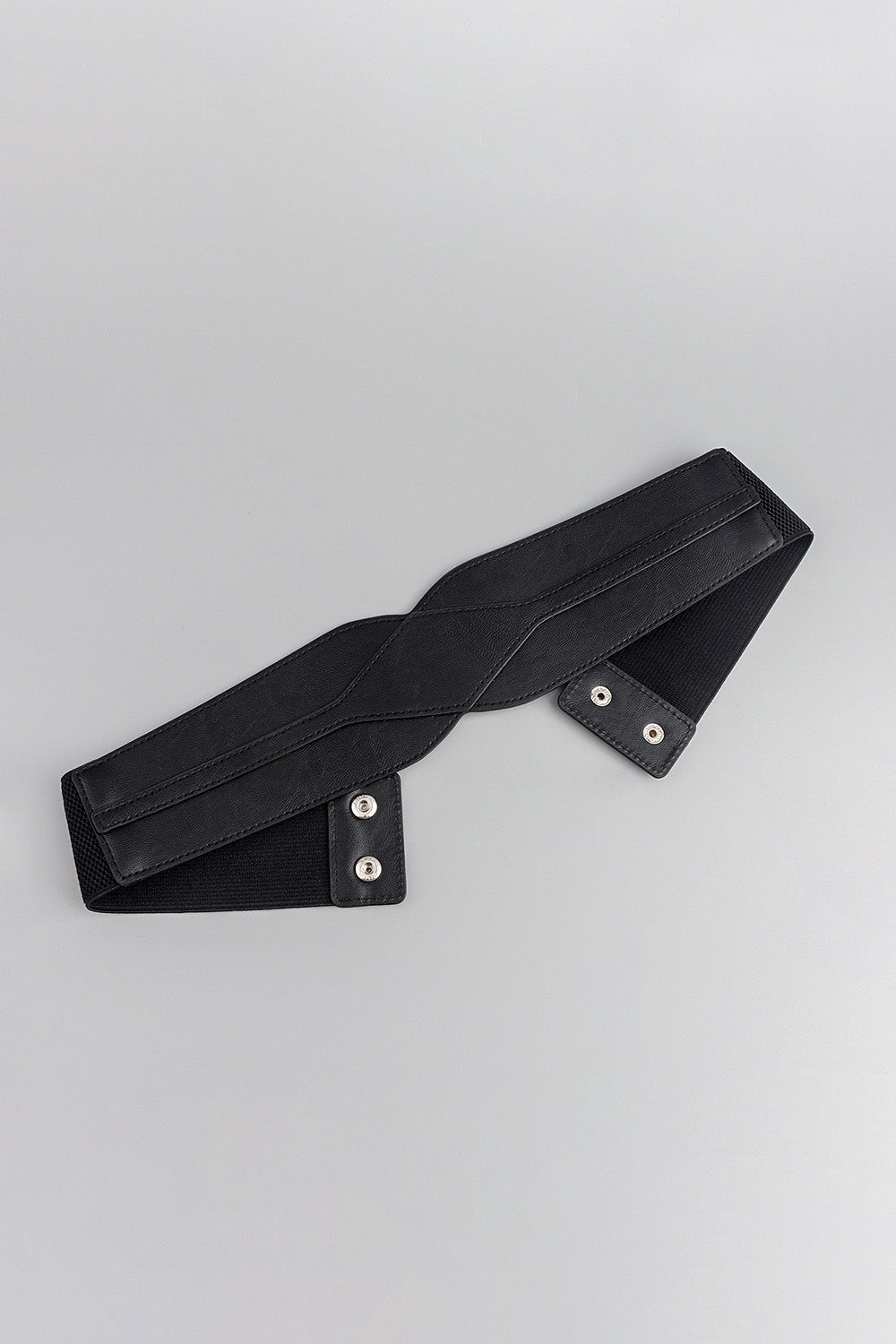 Black elastic belt with sculpted faux leather overlay and silver snap closures