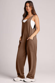 Chocolate relaxed fit jumpsuit with oversized pockets and V-neck.