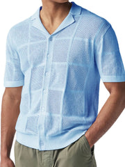 Light blue knit polo shirt with geometric pattern and button front