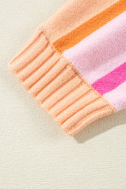 Ombre stripe knit sweater with ribbed cuffs in sherbet and pink hues.