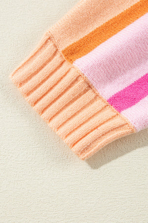 Ombre stripe knit sweater with ribbed cuffs in sherbet and pink hues.