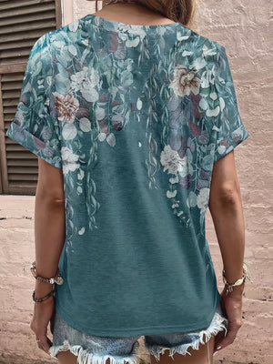 Bohemian tapestry blouse in French Blue with floral print, short sleeves, and crew neck.
