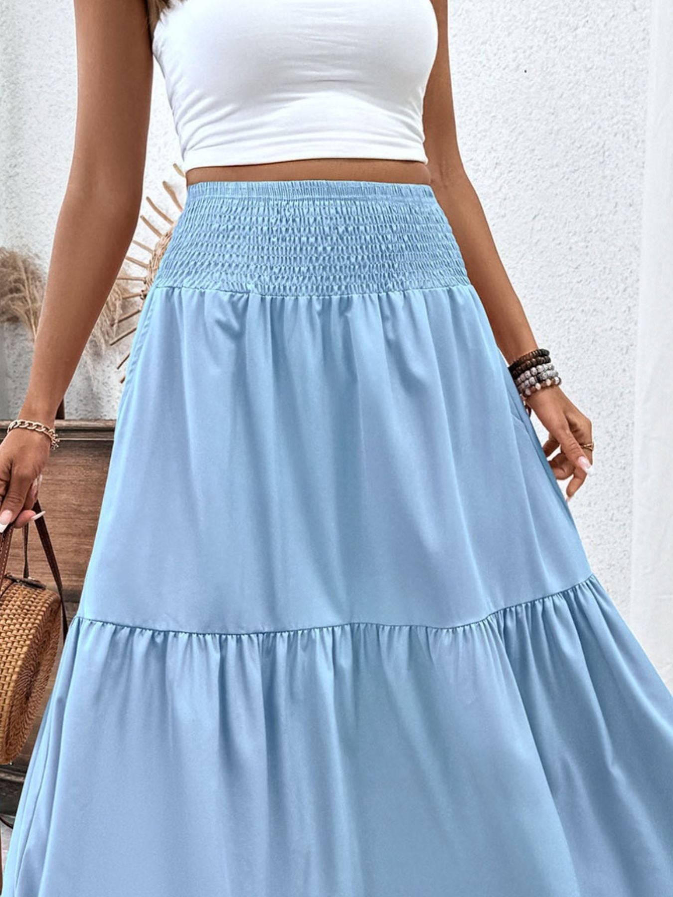 Light blue ruffled smocked waist maxi skirt with tiered hem
