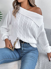 White off-shoulder cable knit pullover sweater with asymmetrical neckline.