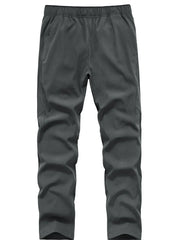 Men's grey sweatpants with elastic waistband and pockets.