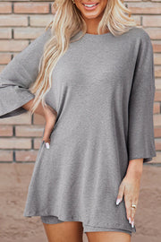 Gray ribbed knit lounge set with relaxed silhouette and 3/4 sleeves.